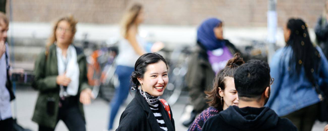 student smiling on campus