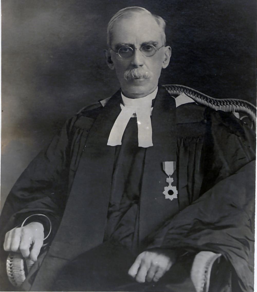 Rev. Thomas Barclay posing for a photograph