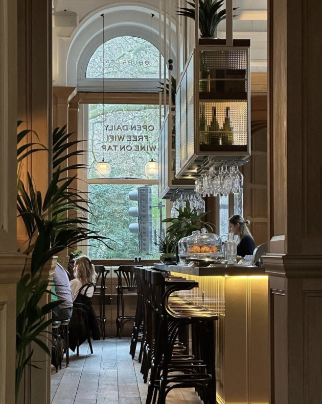 Coffee shop scene with greenery 